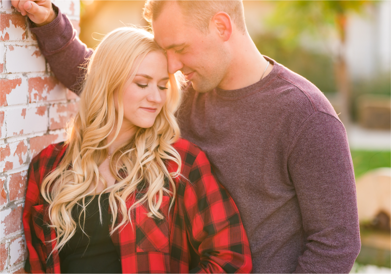 Romantic Fall Farmhouse Engagement at Jessup Farm | Britni Girard Photography | Colorado Wedding Photographer and Videography team | Rustic fences, fall leaves and barn doors in Fort Collins