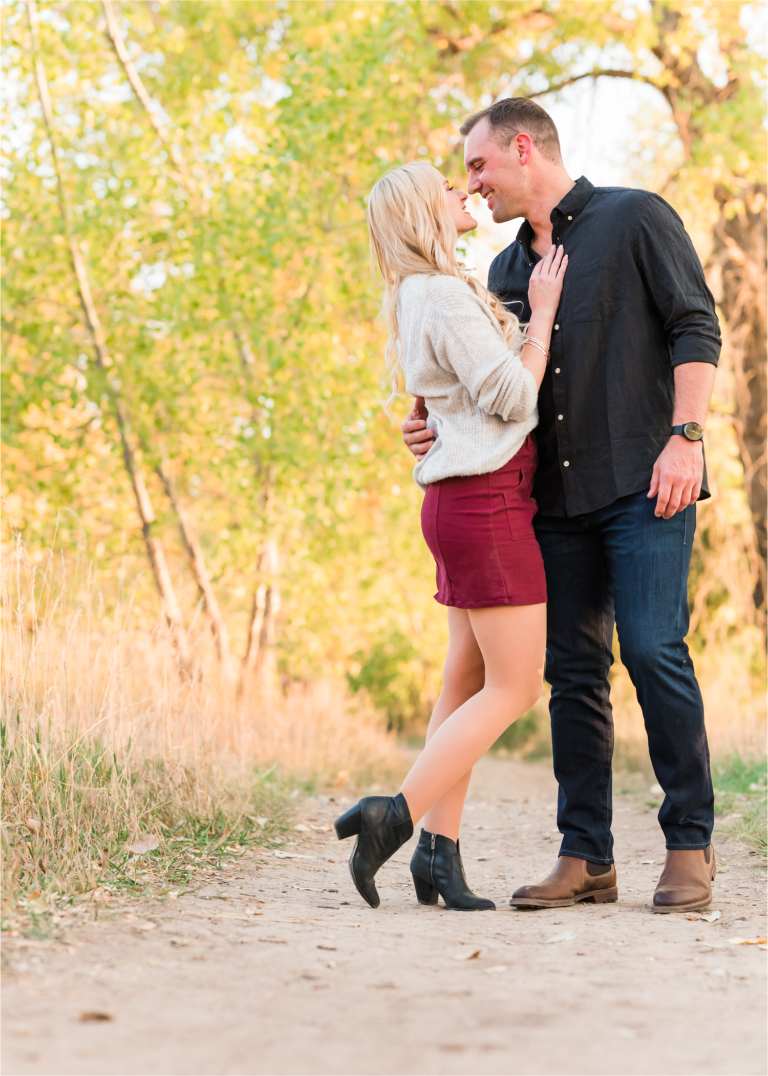 Romantic Fall Farmhouse Engagement at Prospect Ponds River Bend | Britni Girard Photography | Colorado Wedding Photographer and Videography team | Fall Leaves and Romantic Wine stroll in Fort Collins