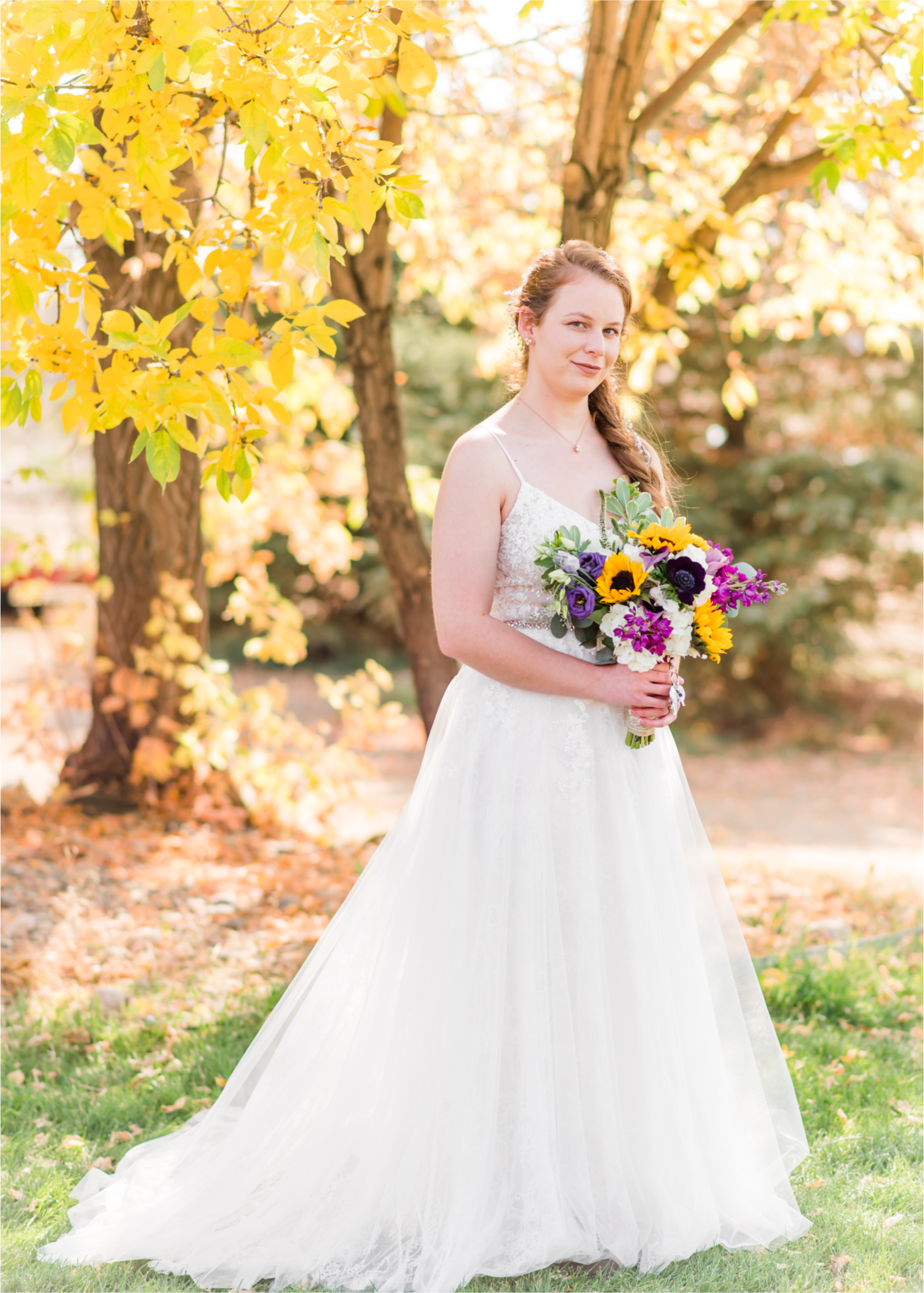 Rustic Fall Wedding at country home overlooking longs peak | Britni Girard Photography | Colorado Wedding Photography and Videography team | Fall colors, country fences leading to mountain views | Relaxed DIY wedding with elegant charm | Florals by Tahnee Wydra | Brides Dress from Abeille Bridal | Best Event Rentals