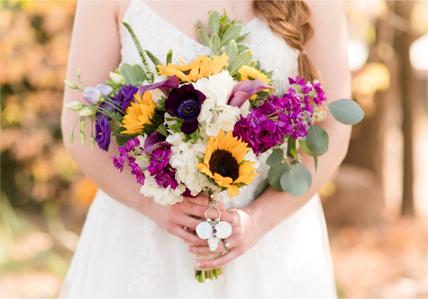 Rustic Fall Wedding at country home overlooking longs peak | Britni Girard Photography | Colorado Wedding Photography and Videography team | Fall colors, country fences leading to mountain views | Relaxed DIY wedding with elegant charm | Florals by Tahnee Wydra | Brides Dress from Abeille Bridal | Best Event Rentals