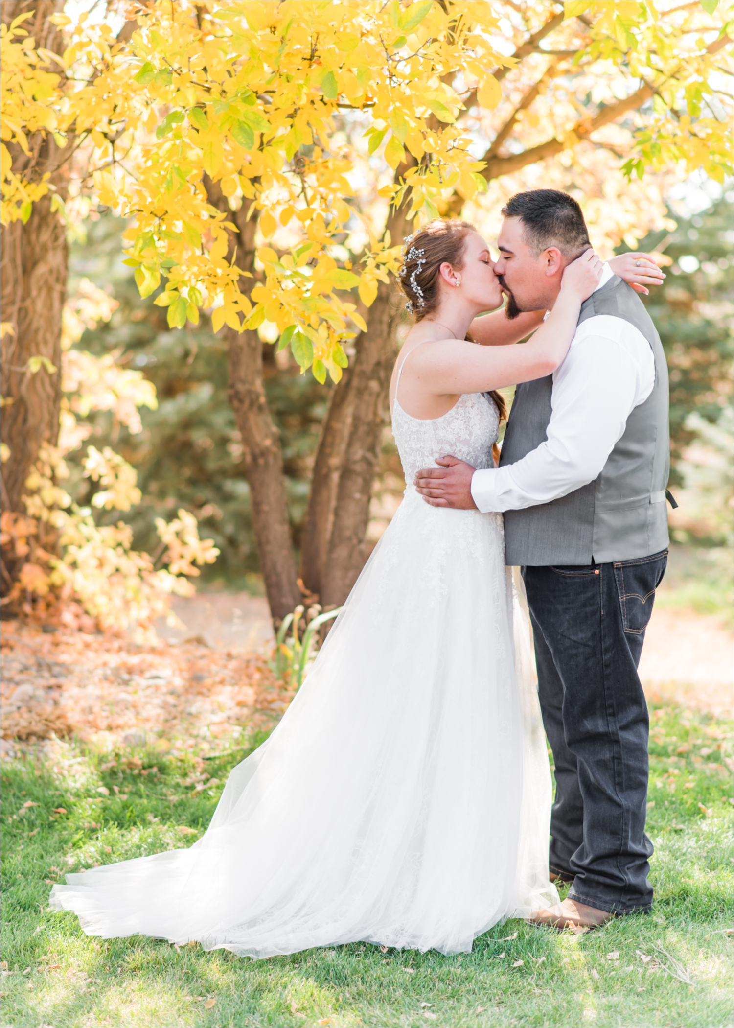 Rustic Fall Wedding at country home overlooking longs peak | Britni Girard Photography | Colorado Wedding Photography and Videography team | Fall colors, country fences leading to mountain views | Relaxed DIY wedding with elegant charm | Florals by Tahnee Wydra | Brides Dress from Abeille Bridal | Best Event Rentals