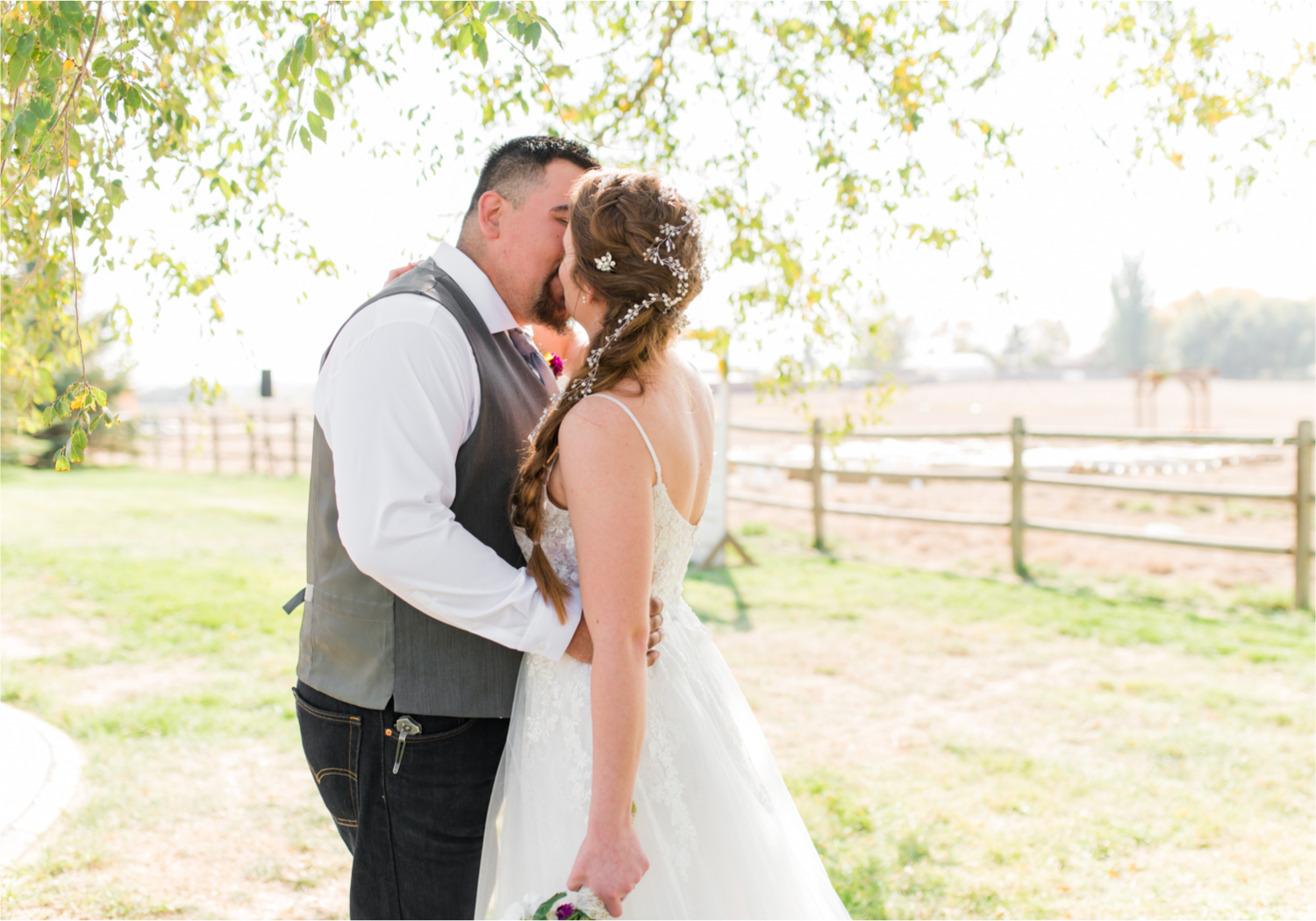 Rustic Fall Wedding at country home overlooking longs peak | Britni Girard Photography | Colorado Wedding Photography and Videography team | Fall colors, country fences leading to mountain views | Relaxed DIY wedding with elegant charm | Florals by Tahnee Wydra | Brides Dress from Abeille Bridal | Best Event Rentals