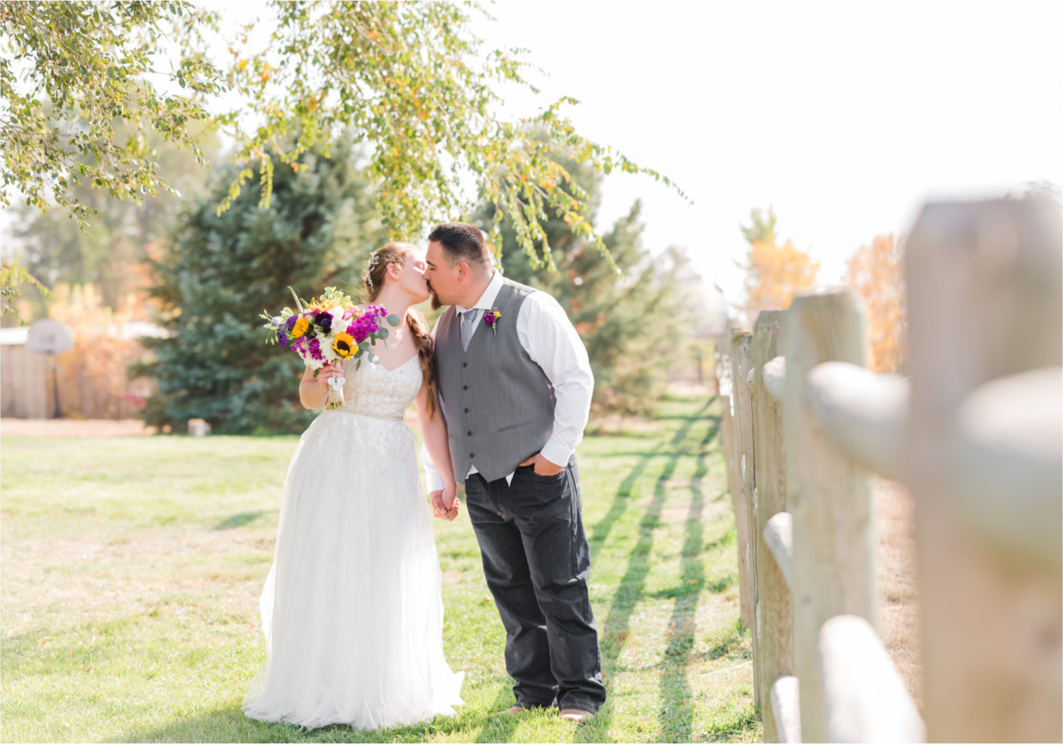 Rustic Fall Wedding at country home overlooking longs peak | Britni Girard Photography | Colorado Wedding Photography and Videography team | Fall colors, country fences leading to mountain views | Relaxed DIY wedding with elegant charm | Florals by Tahnee Wydra | Brides Dress from Abeille Bridal | Best Event Rentals