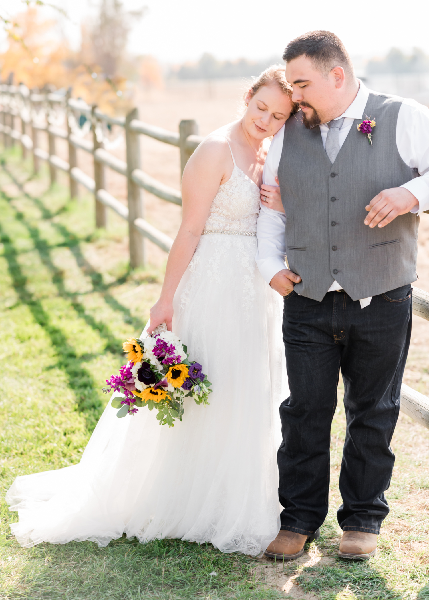 Rustic Fall Wedding at country home overlooking longs peak | Britni Girard Photography | Colorado Wedding Photography and Videography team | Fall colors, country fences leading to mountain views | Relaxed DIY wedding with elegant charm | Florals by Tahnee Wydra | Brides Dress from Abeille Bridal | Best Event Rentals