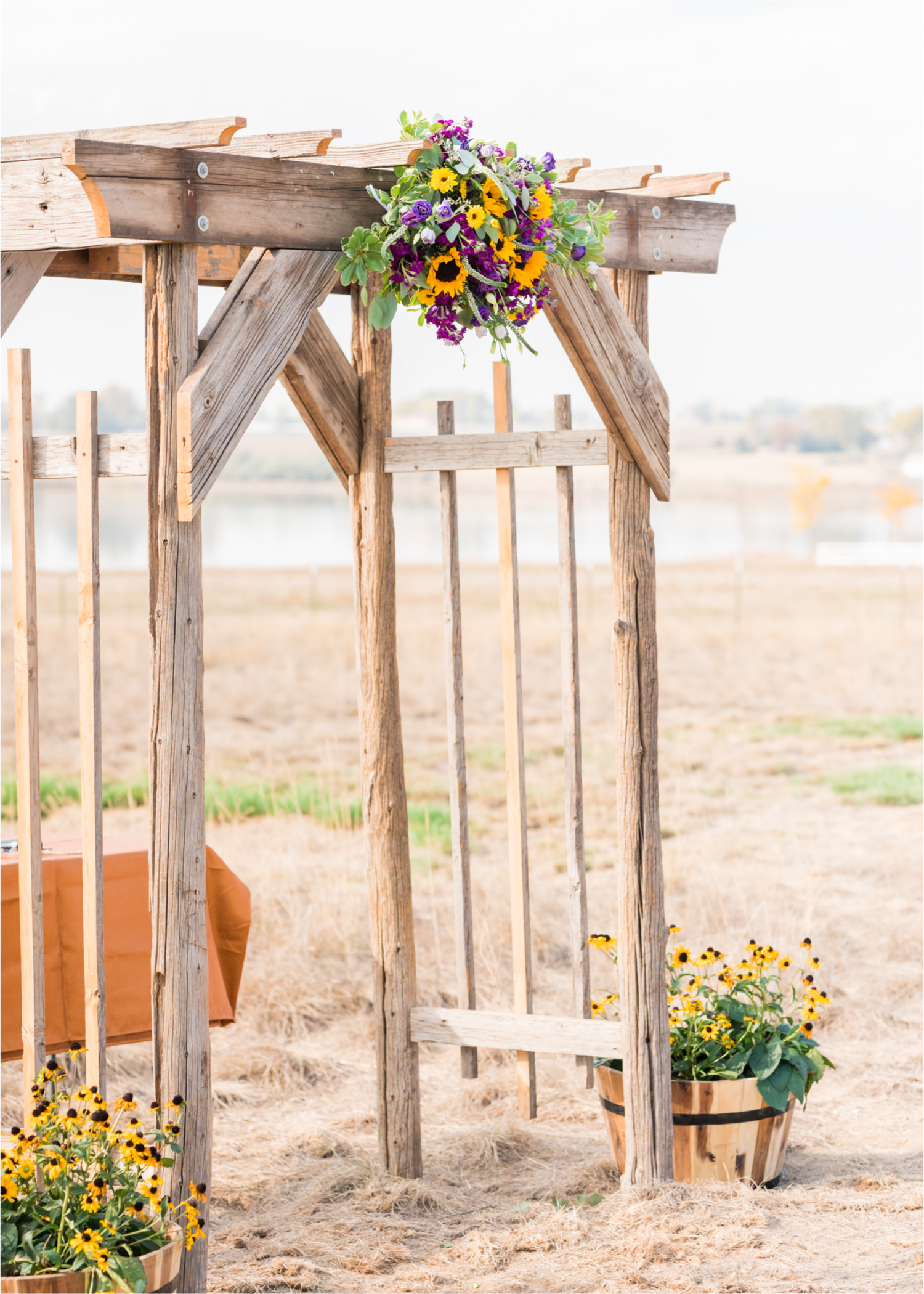 Rustic Fall Wedding at country home overlooking longs peak | Britni Girard Photography | Colorado Wedding Photography and Videography team | Fall colors, country fences leading to mountain views | Relaxed DIY wedding with elegant charm | Florals by Tahnee Wydra | Brides Dress from Abeille Bridal | Best Event Rentals
