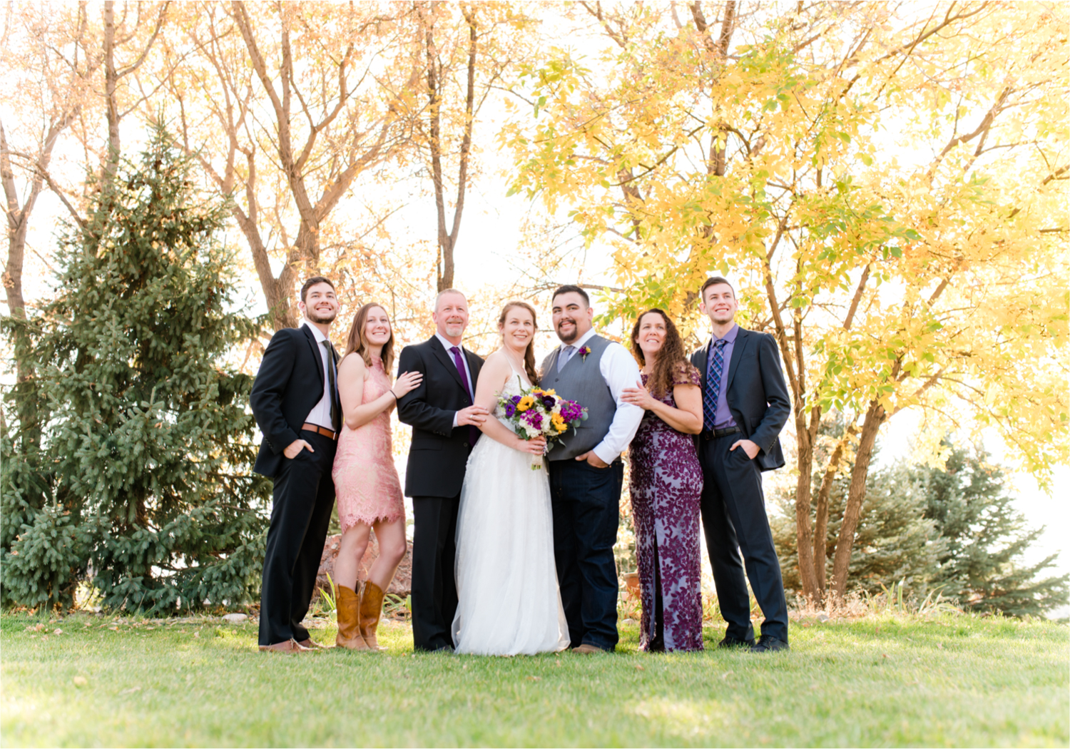 Rustic Fall Wedding at country home overlooking longs peak | Britni Girard Photography | Colorado Wedding Photography and Videography team | Fall colors, country fences leading to mountain views | Relaxed DIY wedding with elegant charm | Florals by Tahnee Wydra | Brides Dress from Abeille Bridal | Best Event Rentals