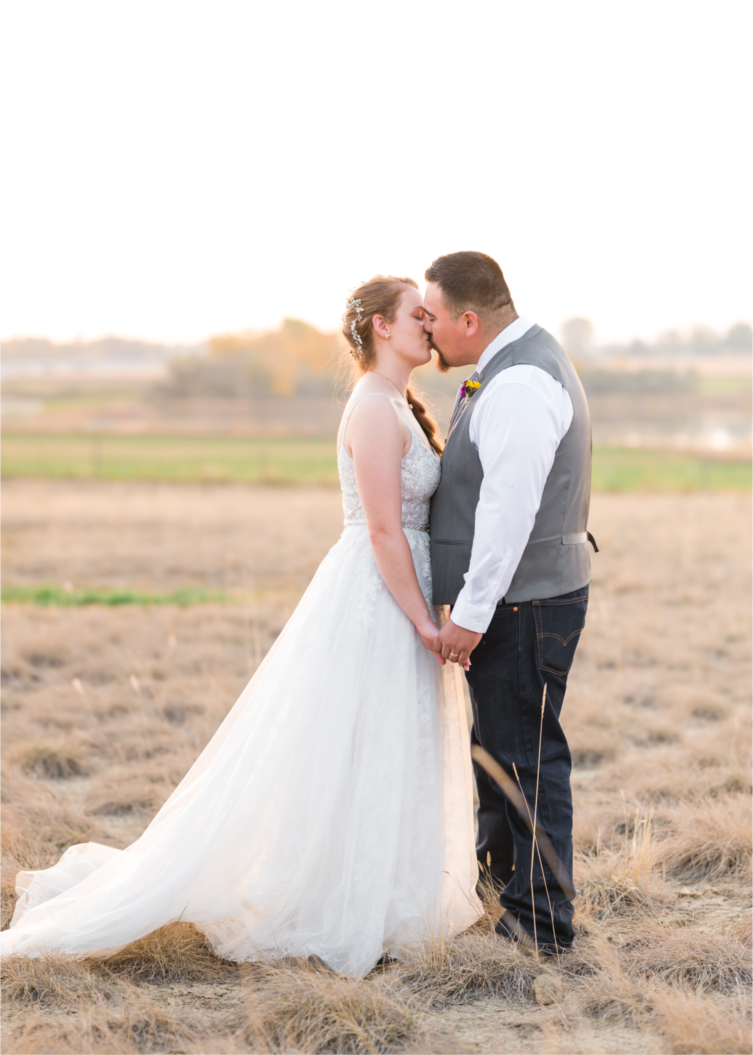 Rustic Fall Wedding at country home overlooking longs peak | Britni Girard Photography | Colorado Wedding Photography and Videography team | Fall colors, country fences leading to mountain views | Relaxed DIY wedding with elegant charm | Florals by Tahnee Wydra | Brides Dress from Abeille Bridal | Best Event Rentals
