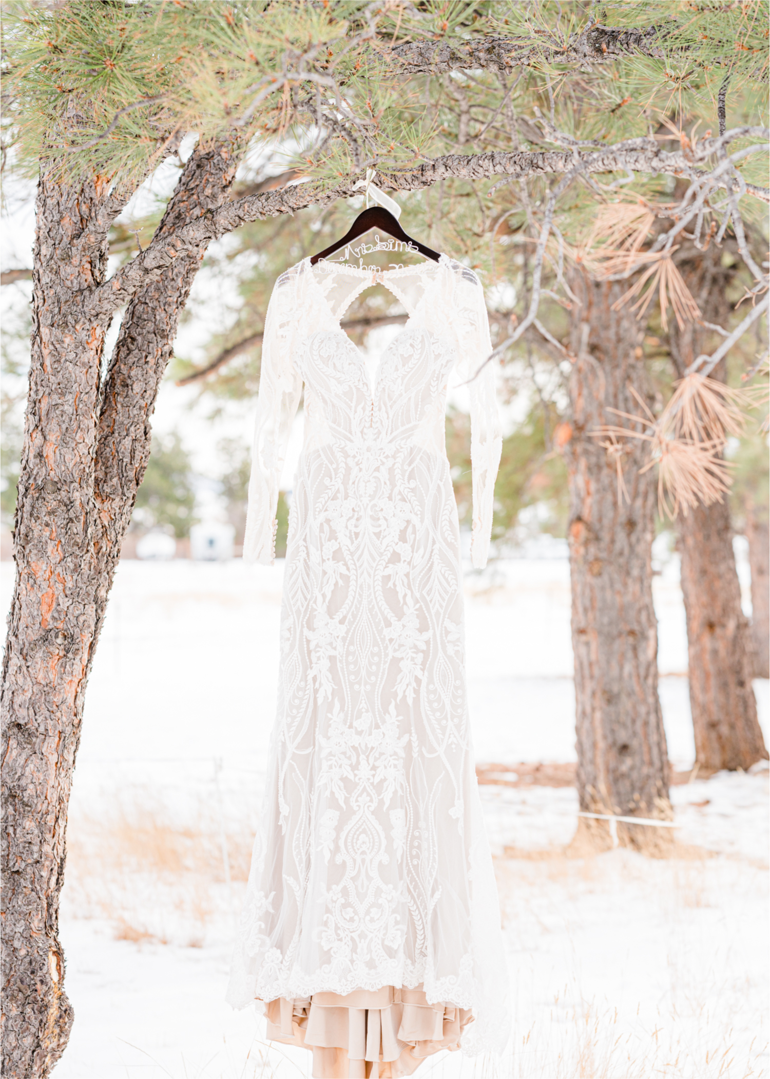 Winter Wonderland Wedding in Colorado Springs | Britni Girard Photography Colorado Wedding Photography and Film Team | Snow covered mountains and Christmas just a few days away | Annika + John's Nostalgic Winter Wedding | Bride's Dress iDream Bridal Essence of Australia 