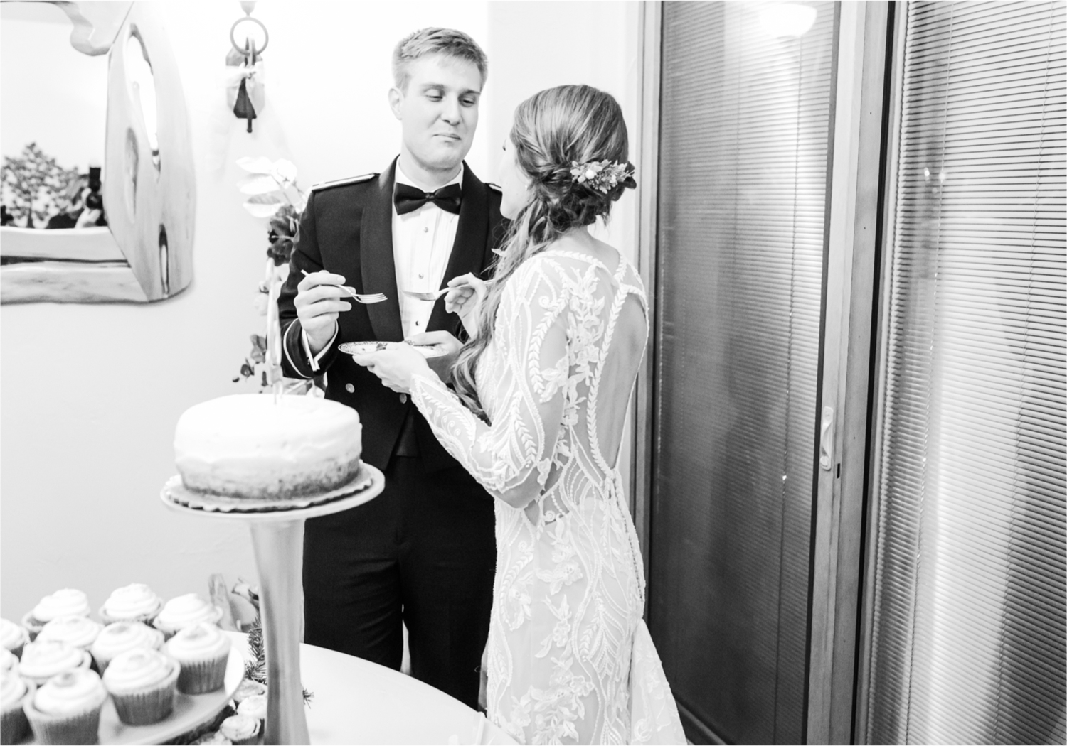 Winter Wonderland Wedding in Colorado Springs | Britni Girard Photography Colorado Wedding Photography and Film Team | Snow covered mountains and Christmas just a few days away | Annika + John's Nostalgic Winter Wedding | Bride's Dress iDream Bridal Essence of Australia | Air Force Academy | Reception with hand-painted mountain backdrops, candelight and Christmas trees.  Burgundy, Navy and Gold | Cakes by King Soopers with 7 types of Christmas Cookies