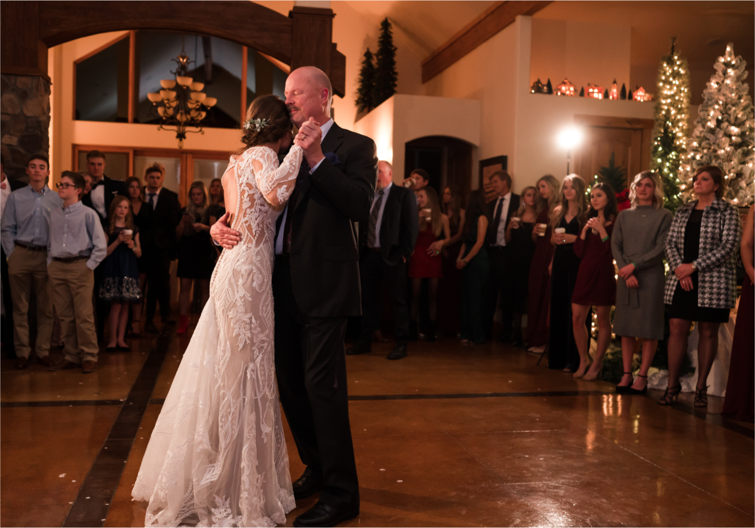 Winter Wonderland Wedding in Colorado Springs | Britni Girard Photography Colorado Wedding Photography and Film Team | Snow covered mountains and Christmas just a few days away | Annika + John's Nostalgic Winter Wedding | Bride's Dress iDream Bridal Essence of Australia | Air Force Academy | Rustic Winter Reception First Dance