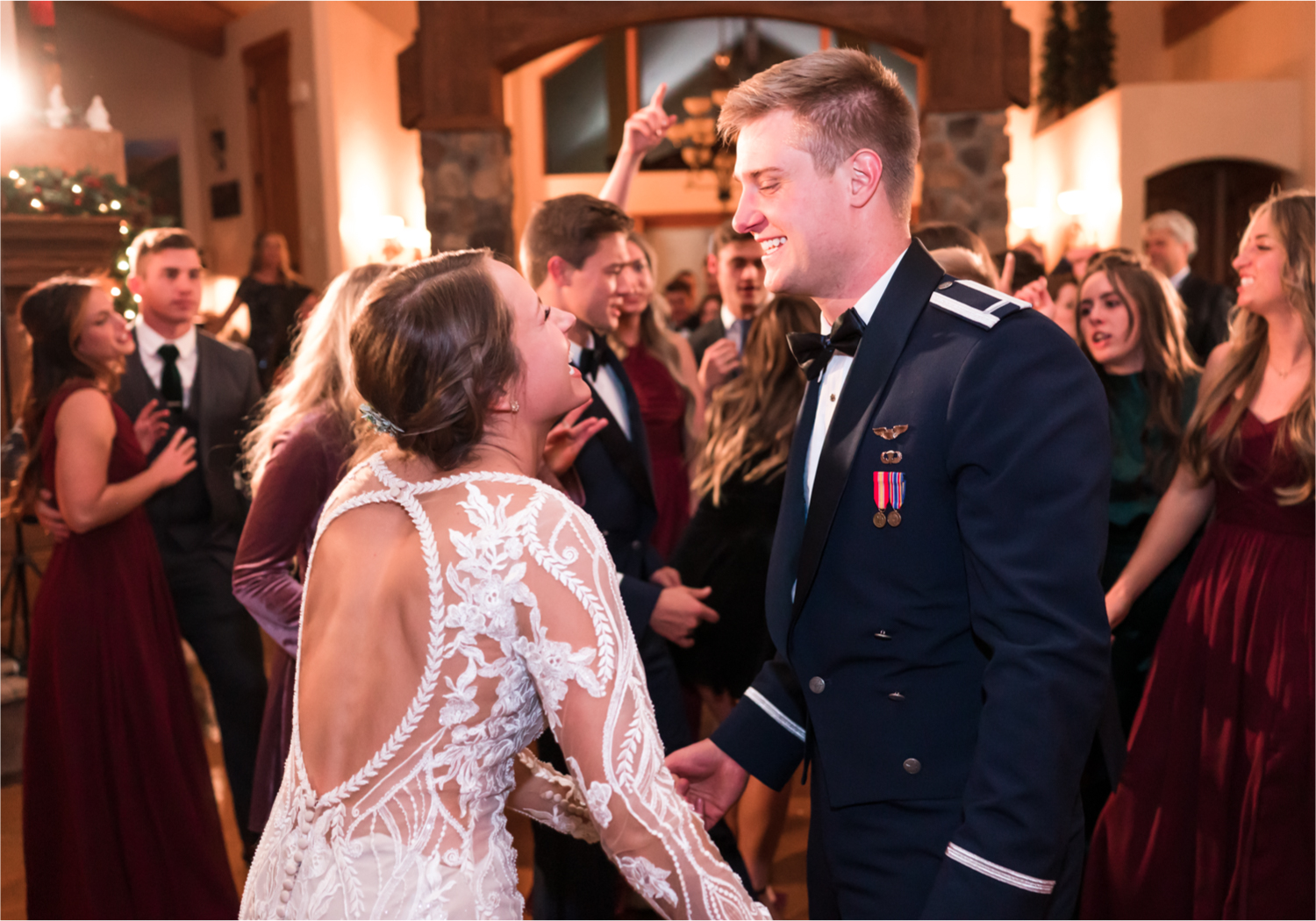 Winter Wonderland Wedding in Colorado Springs | Britni Girard Photography Colorado Wedding Photography and Film Team | Snow covered mountains and Christmas just a few days away | Annika + John's Nostalgic Winter Wedding | Bride's Dress iDream Bridal Essence of Australia | Air Force Academy | Rustic Winter Reception 