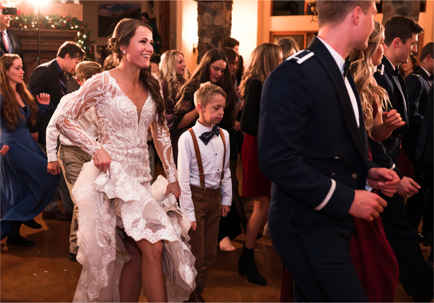 Winter Wonderland Wedding in Colorado Springs | Britni Girard Photography Colorado Wedding Photography and Film Team | Snow covered mountains and Christmas just a few days away | Annika + John's Nostalgic Winter Wedding | Bride's Dress iDream Bridal Essence of Australia | Air Force Academy | Rustic Winter Reception 