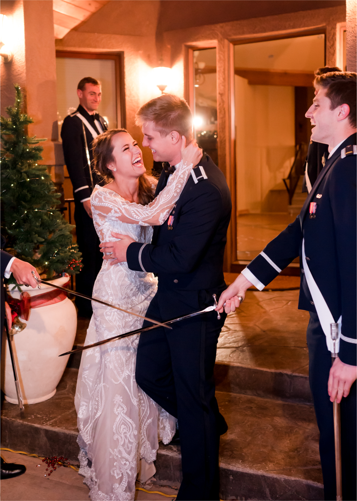 Winter Wonderland Wedding in Colorado Springs | Britni Girard Photography Colorado Wedding Photography and Film Team | Snow covered mountains and Christmas just a few days away | Annika + John's Nostalgic Winter Wedding | Bride's Dress iDream Bridal Essence of Australia | Air Force Academy | Wedding Saber Arch for Military Wedding Exit