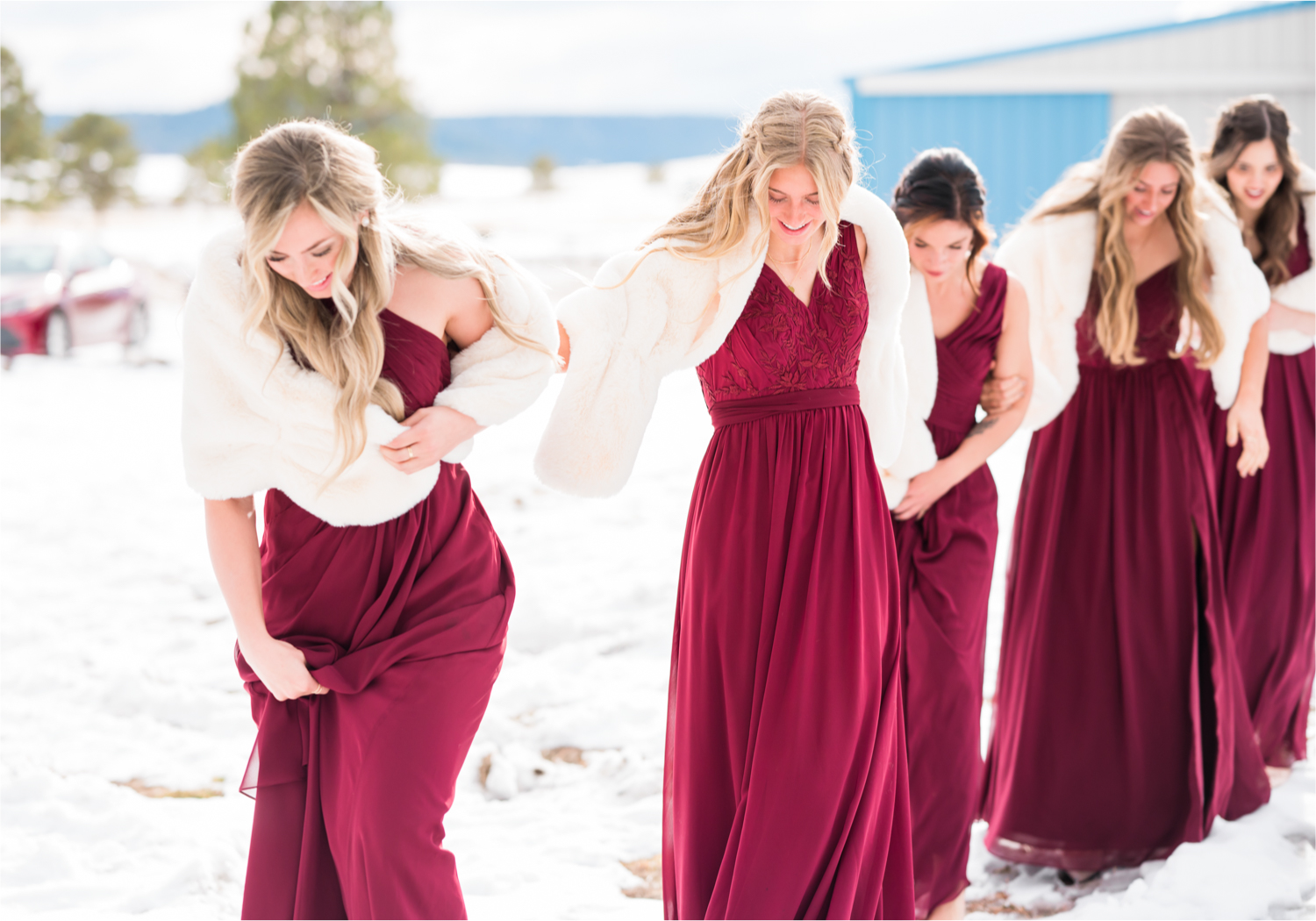 Winter Wonderland Wedding in Colorado Springs | Britni Girard Photography Colorado Wedding Photography and Film Team | Snow covered mountains and Christmas just a few days away | Annika + John's Nostalgic Winter Wedding | Bride's Dress iDream Bridal Essence of Australia | Air Force Academy | Bridesmaid First Look | Bridesmaid Dresses by Azazie