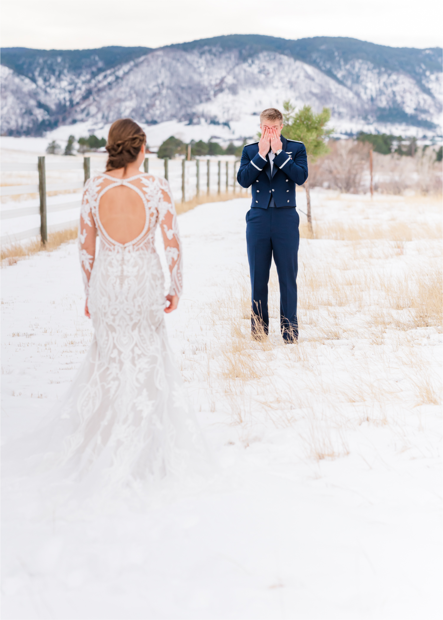 Winter Wonderland Wedding in Colorado Springs | Britni Girard Photography Colorado Wedding Photography and Film Team | Snow covered mountains and Christmas just a few days away | Annika + John's Nostalgic Winter Wedding | Bride's Dress iDream Bridal Essence of Australia | Air Force Academy | First Look in Snow and Bride and Groom Letters back to back