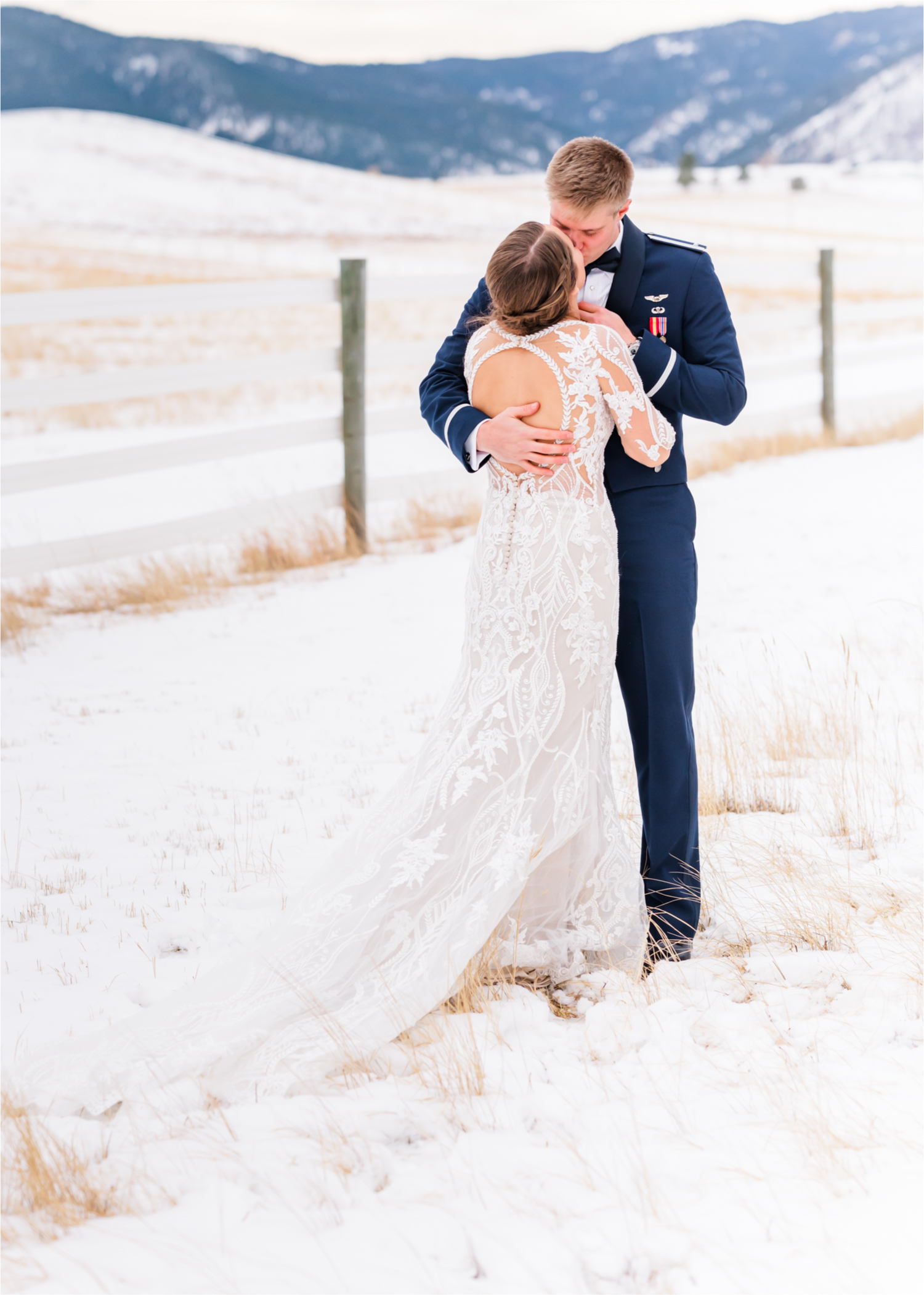 Winter Wonderland Wedding in Colorado Springs | Britni Girard Photography Colorado Wedding Photography and Film Team | Snow covered mountains and Christmas just a few days away | Annika + John's Nostalgic Winter Wedding | Bride's Dress iDream Bridal Essence of Australia | Air Force Academy | First Look in Snow and Bride and Groom Letters back to back