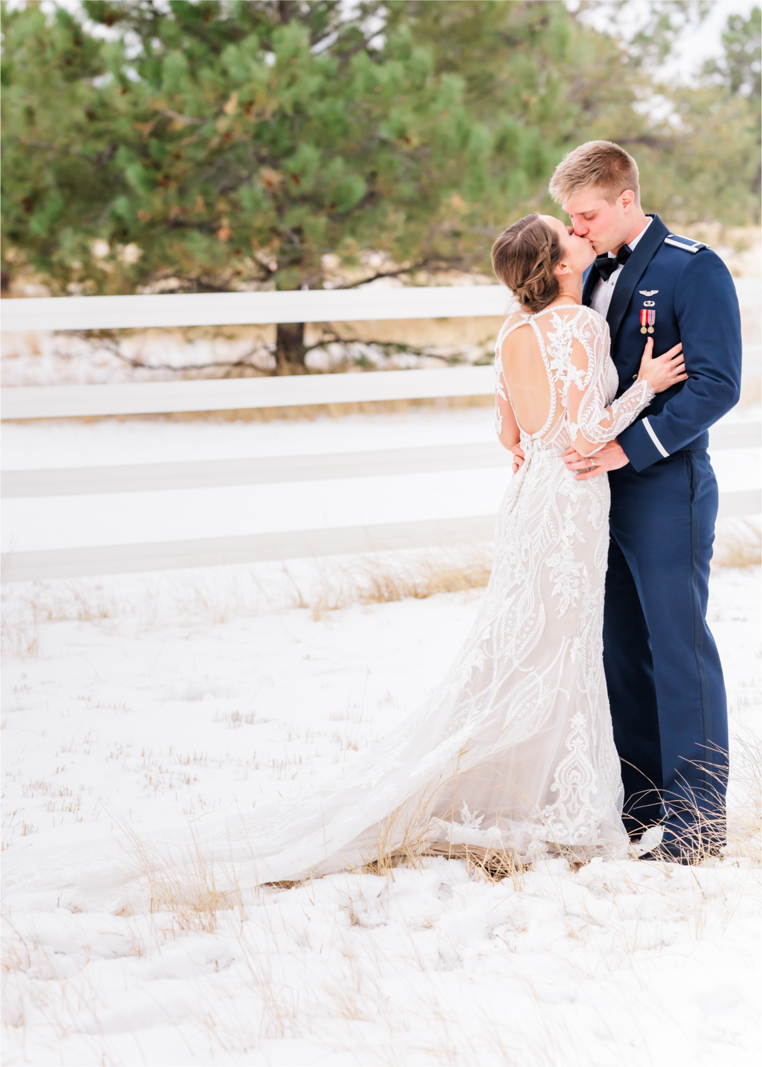 Winter Wonderland Wedding in Colorado Springs | Britni Girard Photography Colorado Wedding Photography and Film Team | Snow covered mountains and Christmas just a few days away | Annika + John's Nostalgic Winter Wedding | Bride's Dress iDream Bridal Essence of Australia | Air Force Academy | First Look in Snow and Bride and Groom Letters back to back