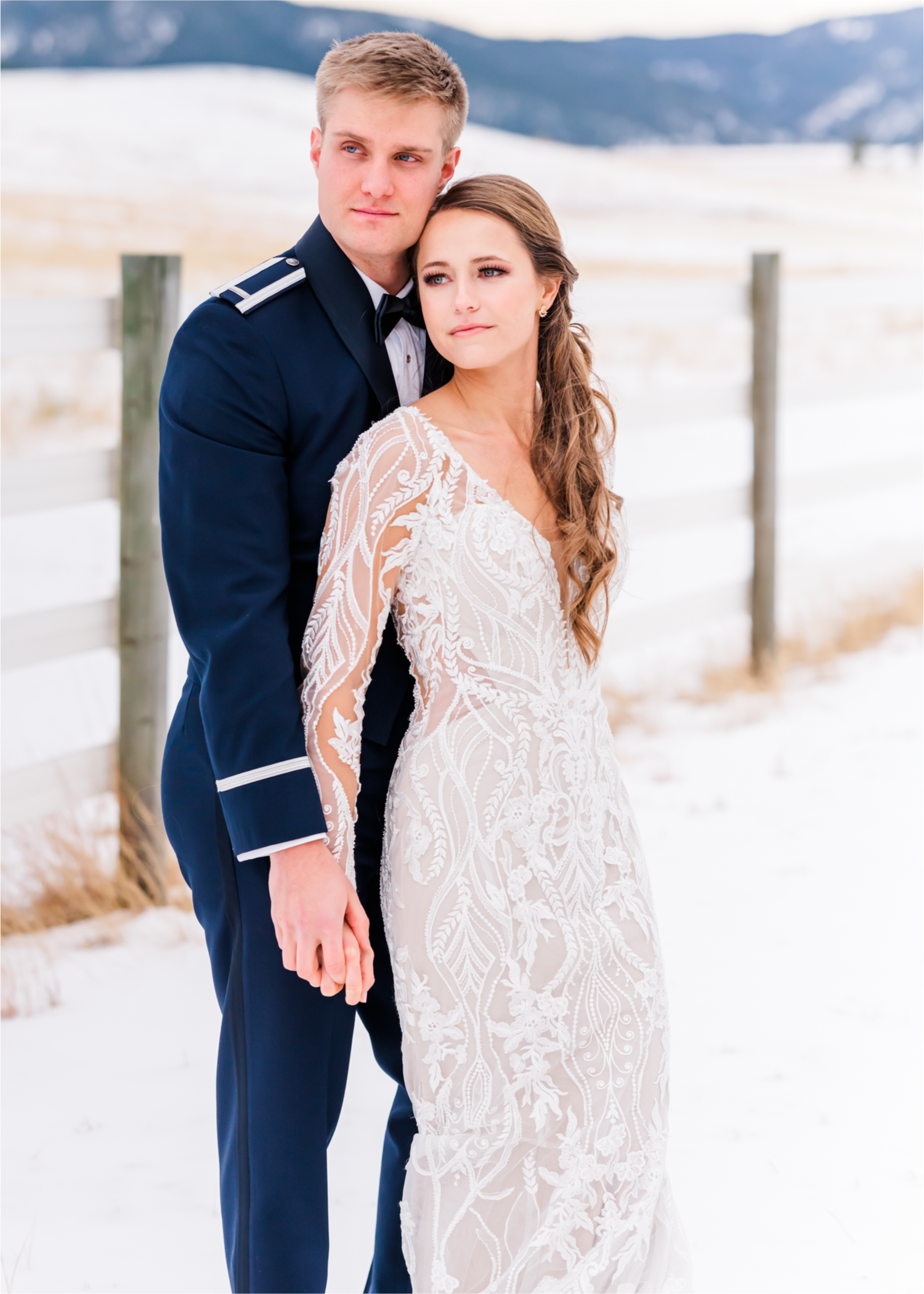 Winter Wonderland Wedding in Colorado Springs | Britni Girard Photography Colorado Wedding Photography and Film Team | Snow covered mountains and Christmas just a few days away | Annika + John's Nostalgic Winter Wedding | Bride's Dress iDream Bridal Essence of Australia | Air Force Academy | Snowy Bride and Groom Portraits