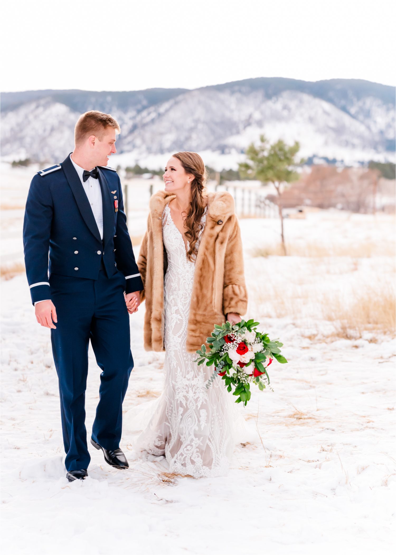 Winter Wonderland Wedding in Colorado Springs | Britni Girard Photography Colorado Wedding Photography and Film Team | Snow covered mountains and Christmas just a few days away | Annika + John's Nostalgic Winter Wedding | Bride's Dress iDream Bridal Essence of Australia | Air Force Academy | Snowy Bride and Groom Portraits