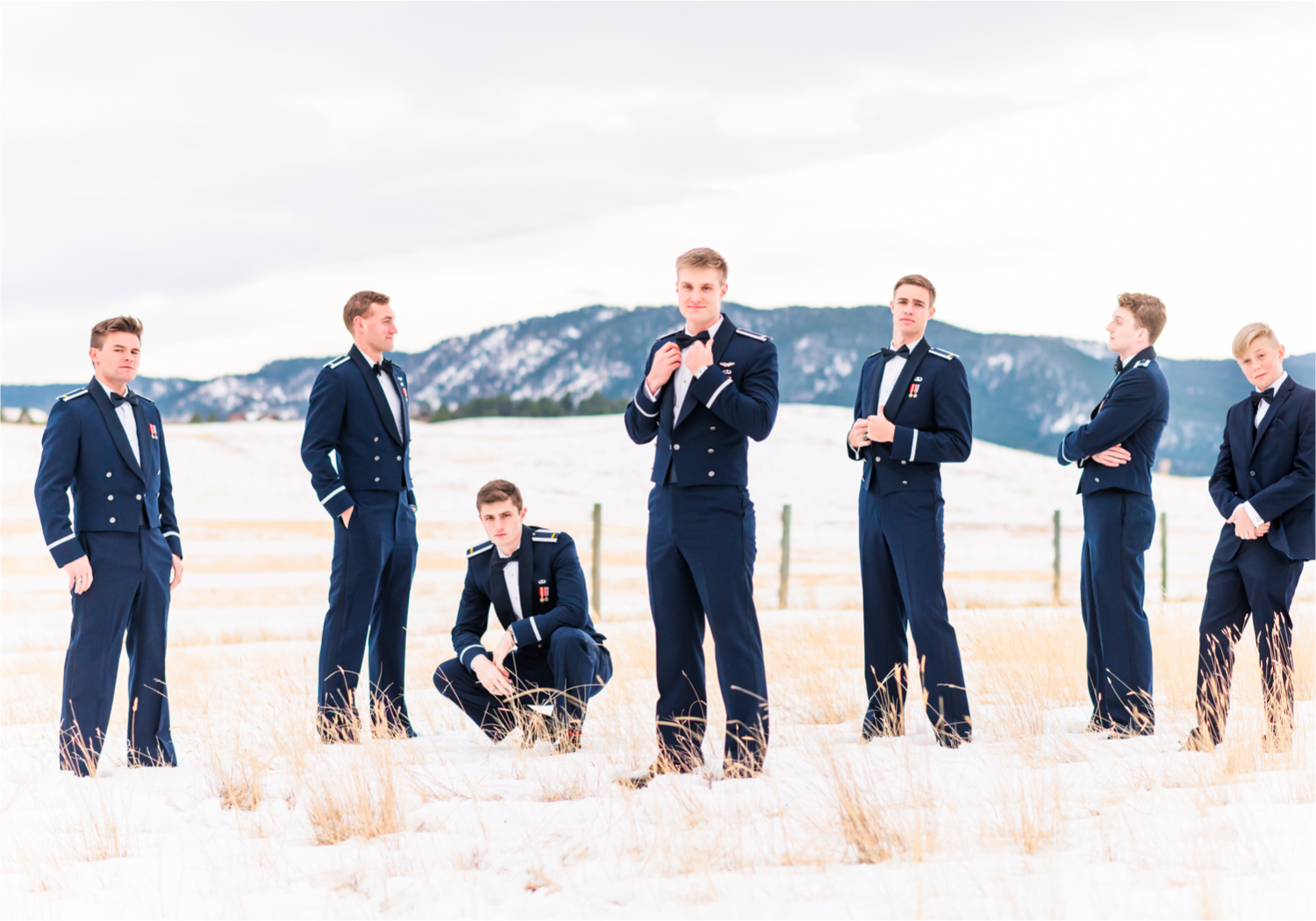 Winter Wonderland Wedding in Colorado Springs | Britni Girard Photography Colorado Wedding Photography and Film Team | Snow covered mountains and Christmas just a few days away | Annika + John's Nostalgic Winter Wedding | Bride's Dress iDream Bridal Essence of Australia | Air Force Academy | Snowy Wedding Party Portraits Air Force Groomsmen