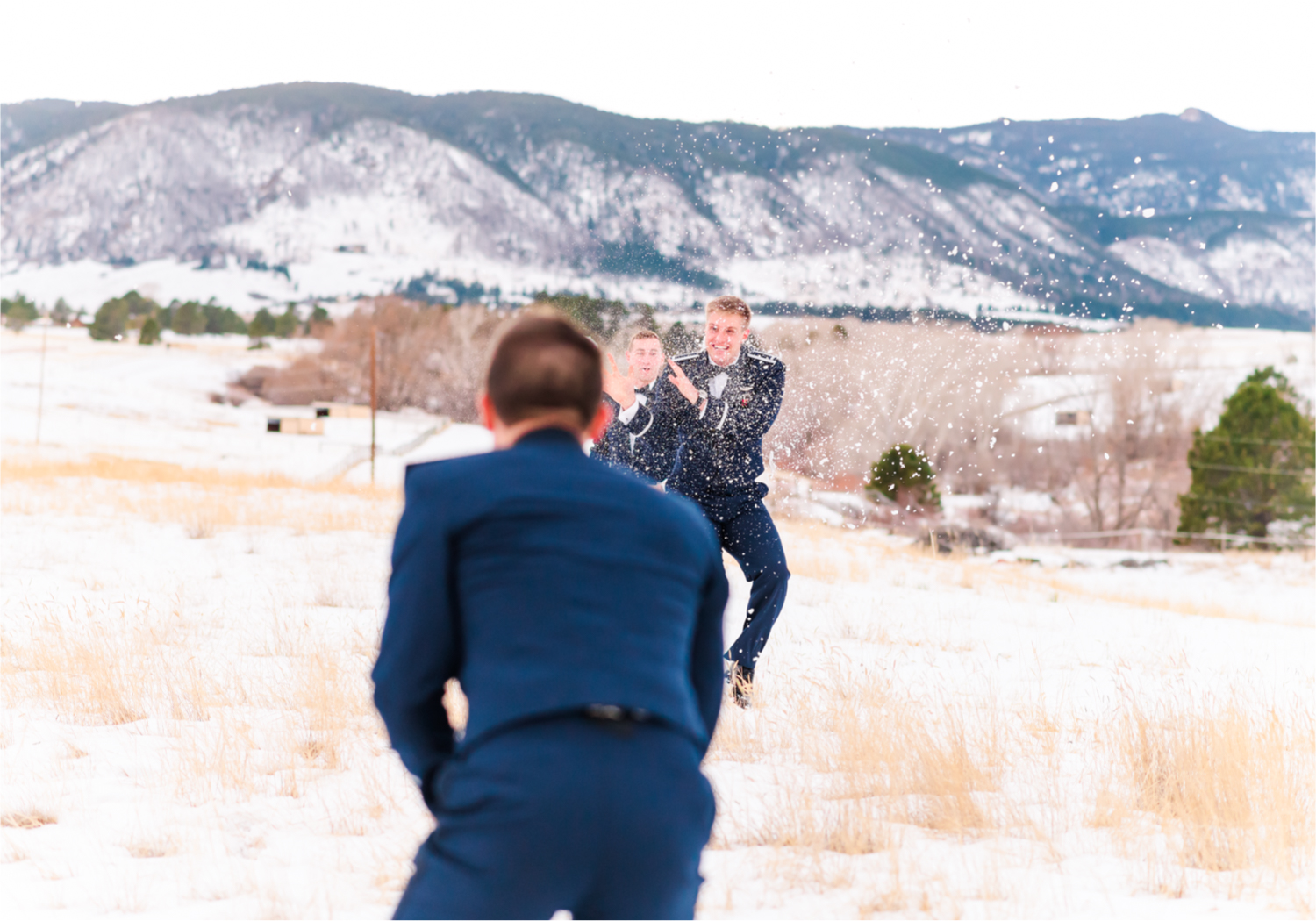 Winter Wonderland Wedding in Colorado Springs | Britni Girard Photography Colorado Wedding Photography and Film Team | Snow covered mountains and Christmas just a few days away | Annika + John's Nostalgic Winter Wedding | Bride's Dress iDream Bridal Essence of Australia | Air Force Academy | Snowy Wedding Party Portraits Air Force Groomsmen