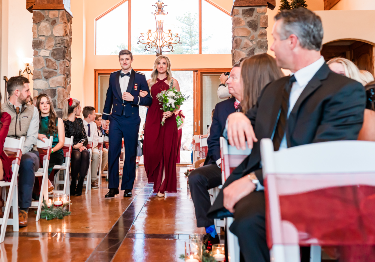 Winter Wonderland Wedding in Colorado Springs | Britni Girard Photography Colorado Wedding Photography and Film Team | Snow covered mountains and Christmas just a few days away | Annika + John's Nostalgic Winter Wedding | Bride's Dress iDream Bridal Essence of Australia | Air Force Academy | Ceremony Entrance Rustic Cabin 