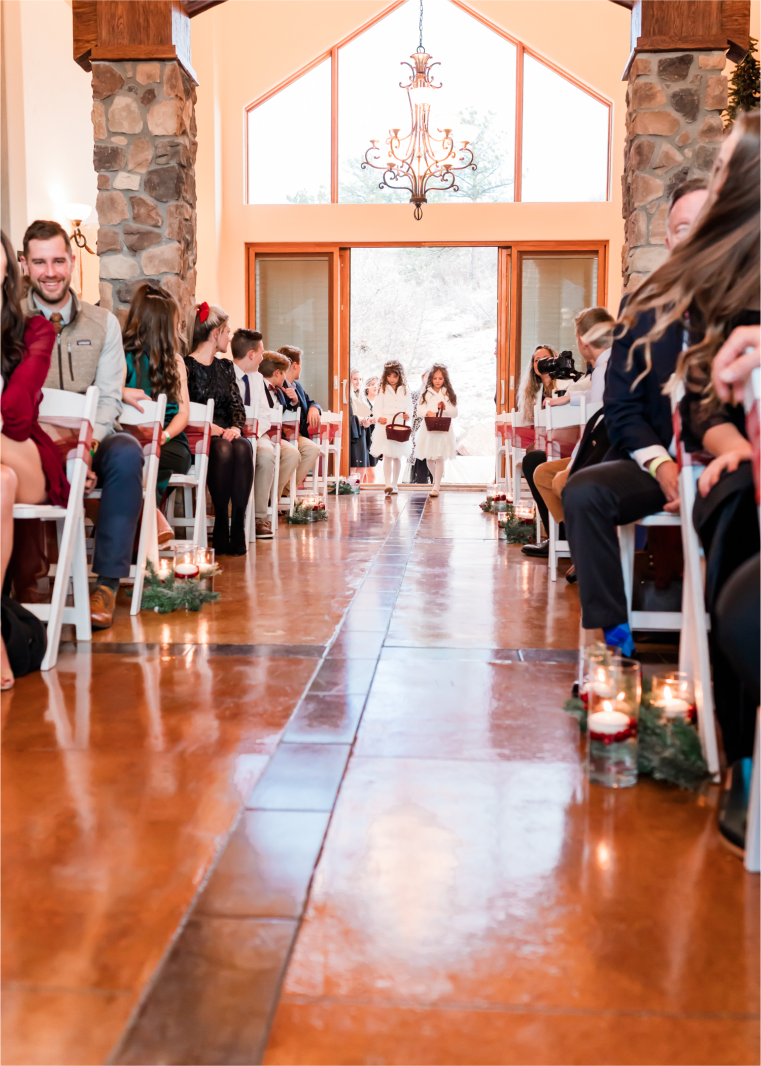 Winter Wonderland Wedding in Colorado Springs | Britni Girard Photography Colorado Wedding Photography and Film Team | Snow covered mountains and Christmas just a few days away | Annika + John's Nostalgic Winter Wedding | Bride's Dress iDream Bridal Essence of Australia | Air Force Academy | Ceremony Entrance Rustic Cabin 