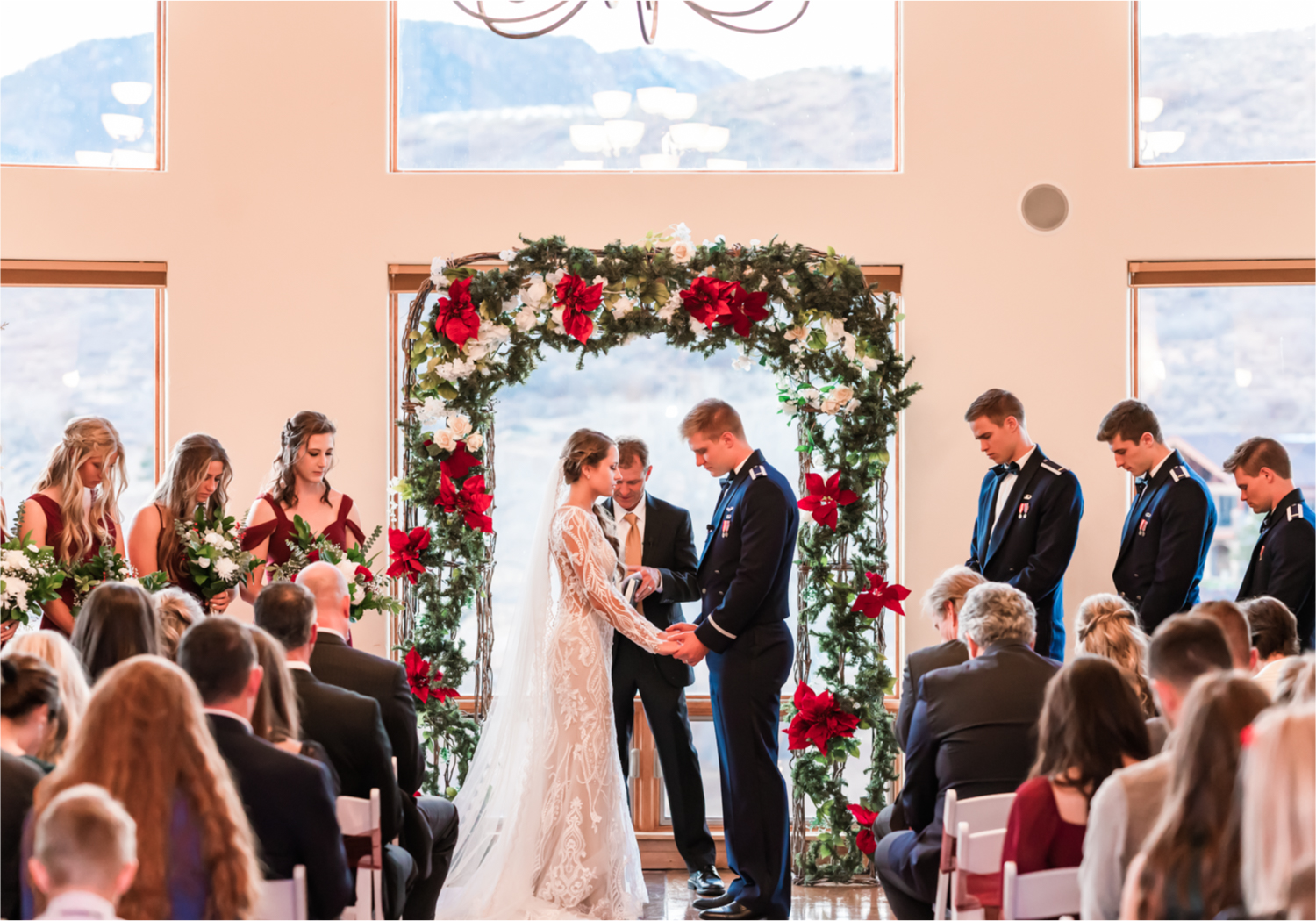 Winter Wonderland Wedding in Colorado Springs | Britni Girard Photography Colorado Wedding Photography and Film Team | Snow covered mountains and Christmas just a few days away | Annika + John's Nostalgic Winter Wedding | Bride's Dress iDream Bridal Essence of Australia | Air Force Academy | Ceremony Entrance Rustic Cabin 