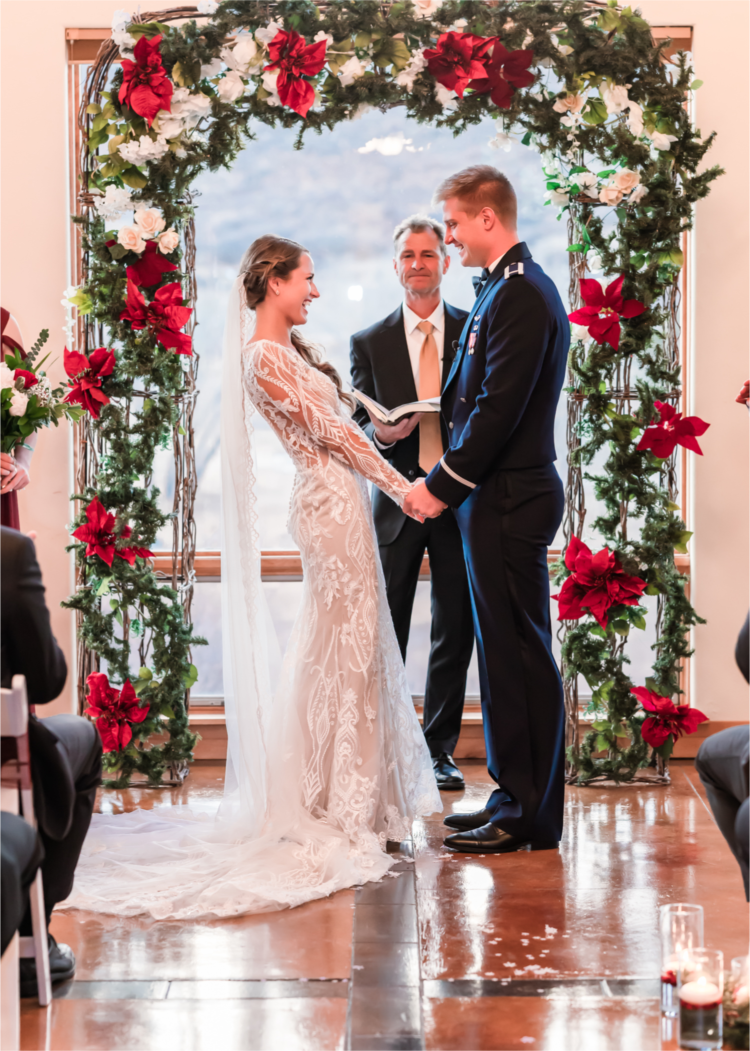 Winter Wonderland Wedding in Colorado Springs | Britni Girard Photography Colorado Wedding Photography and Film Team | Snow covered mountains and Christmas just a few days away | Annika + John's Nostalgic Winter Wedding | Bride's Dress iDream Bridal Essence of Australia | Air Force Academy | Ceremony Entrance Rustic Cabin 