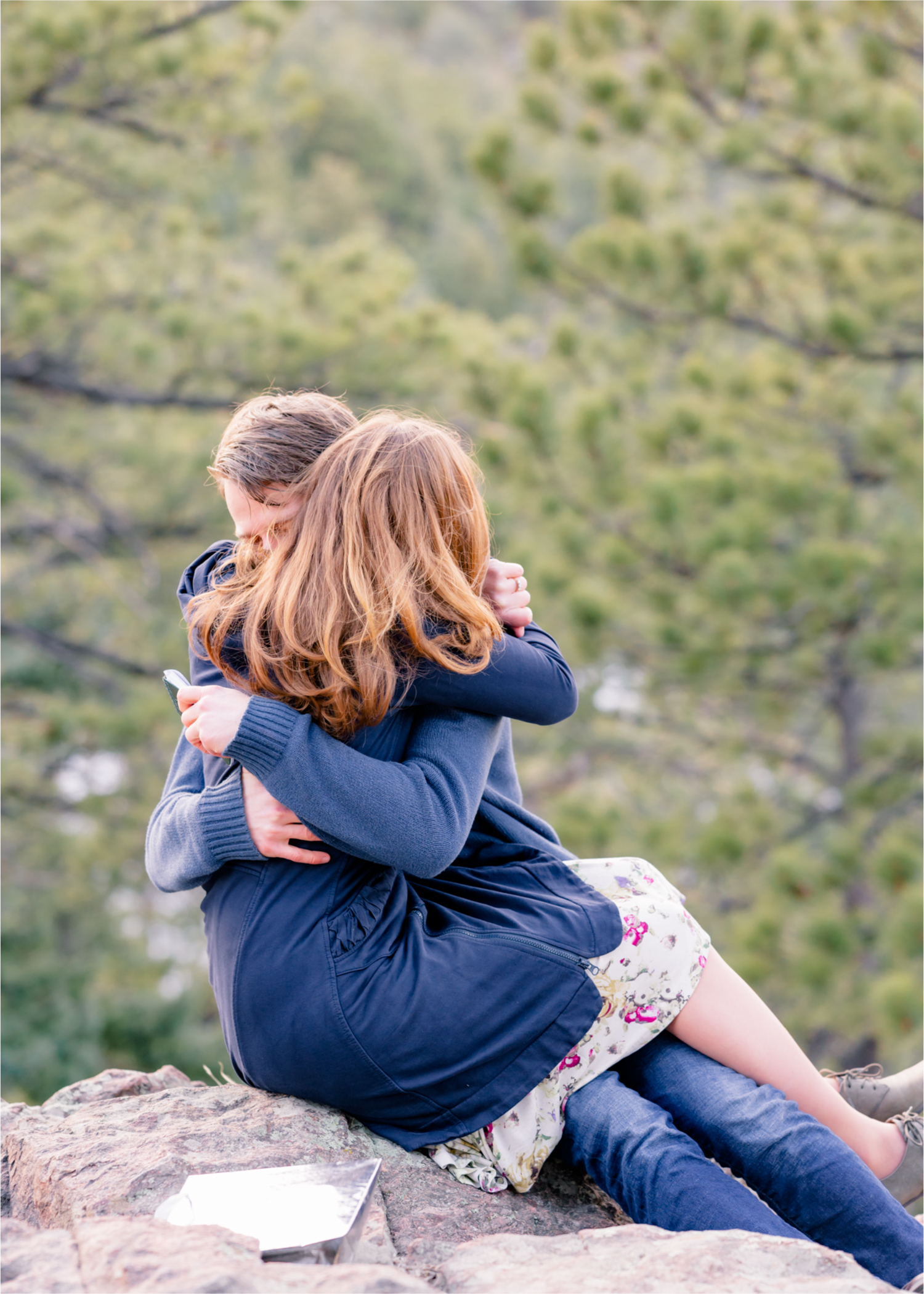 Winter Engagement on Lookout Mountain in Golden Colorado | Britni Girard Photography | Destination Photo and Video Team | Epic views of Golden, dreamy sunsets, dancing and snuggles.  A sweet couple shares time of prayer together during their romantic engagement session.