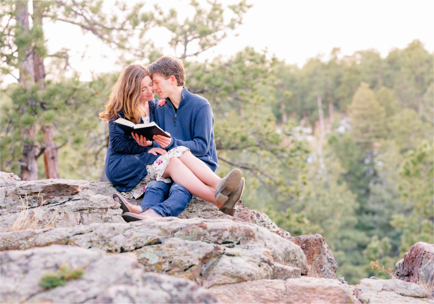 Winter Engagement on Lookout Mountain in Golden Colorado | Britni Girard Photography | Destination Photo and Video Team | Epic views of Golden, dreamy sunsets, dancing and snuggles.  A sweet couple shares time of prayer together during their romantic engagement session.