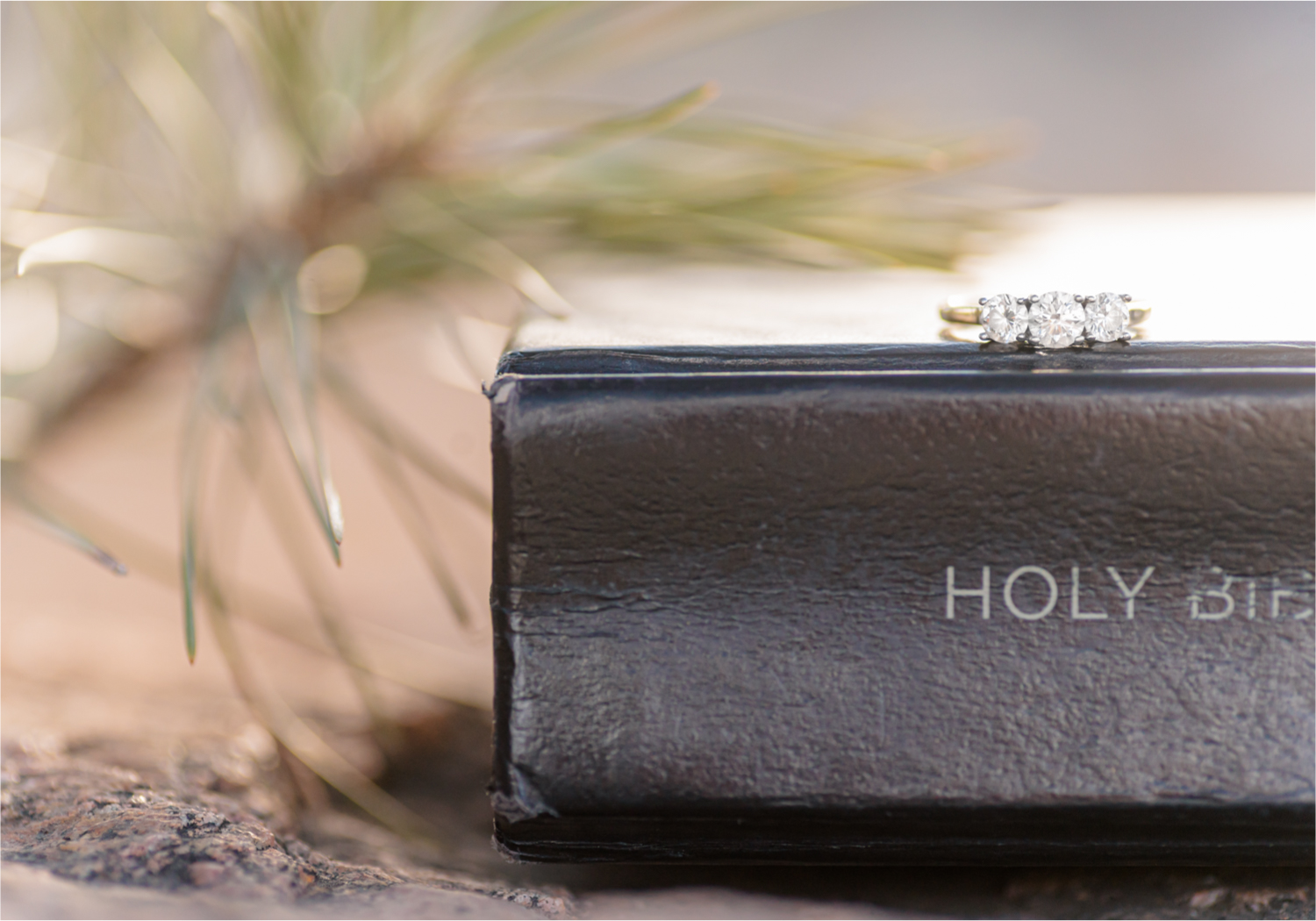 Winter Engagement on Lookout Mountain in Golden Colorado | Britni Girard Photography | Destination Photo and Video Team | Epic views of Golden, dreamy sunsets, dancing and snuggles.  Engagement Ring and Bible. A sweet couple shares time of prayer together during their romantic engagement session.