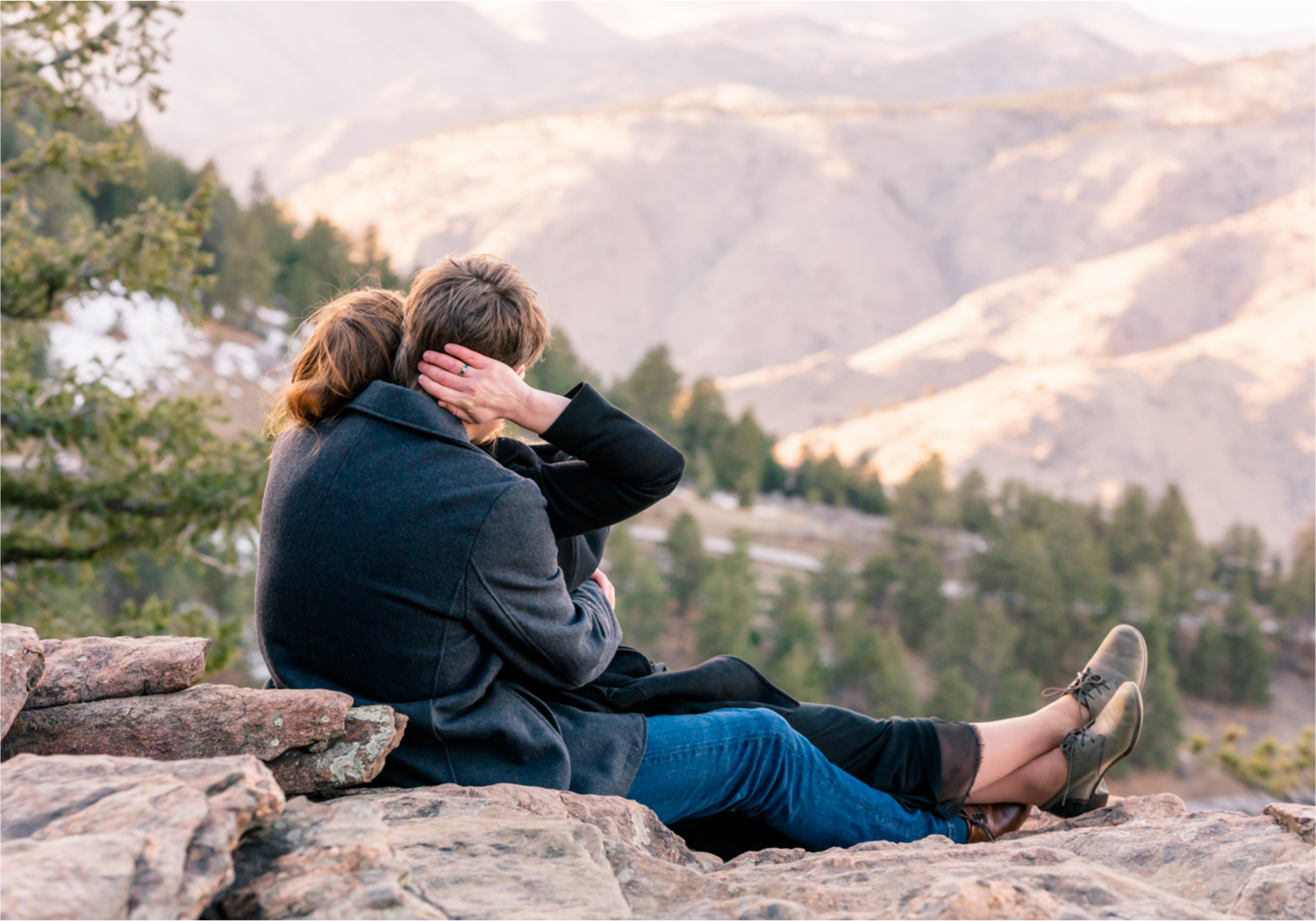 Winter Engagement on Lookout Mountain in Golden Colorado | Britni Girard Photography | Destination Photo and Video Team | Epic views of Golden, dreamy sunsets, dancing and snuggles.  A sweet couple shares time of prayer together during their romantic engagement session.