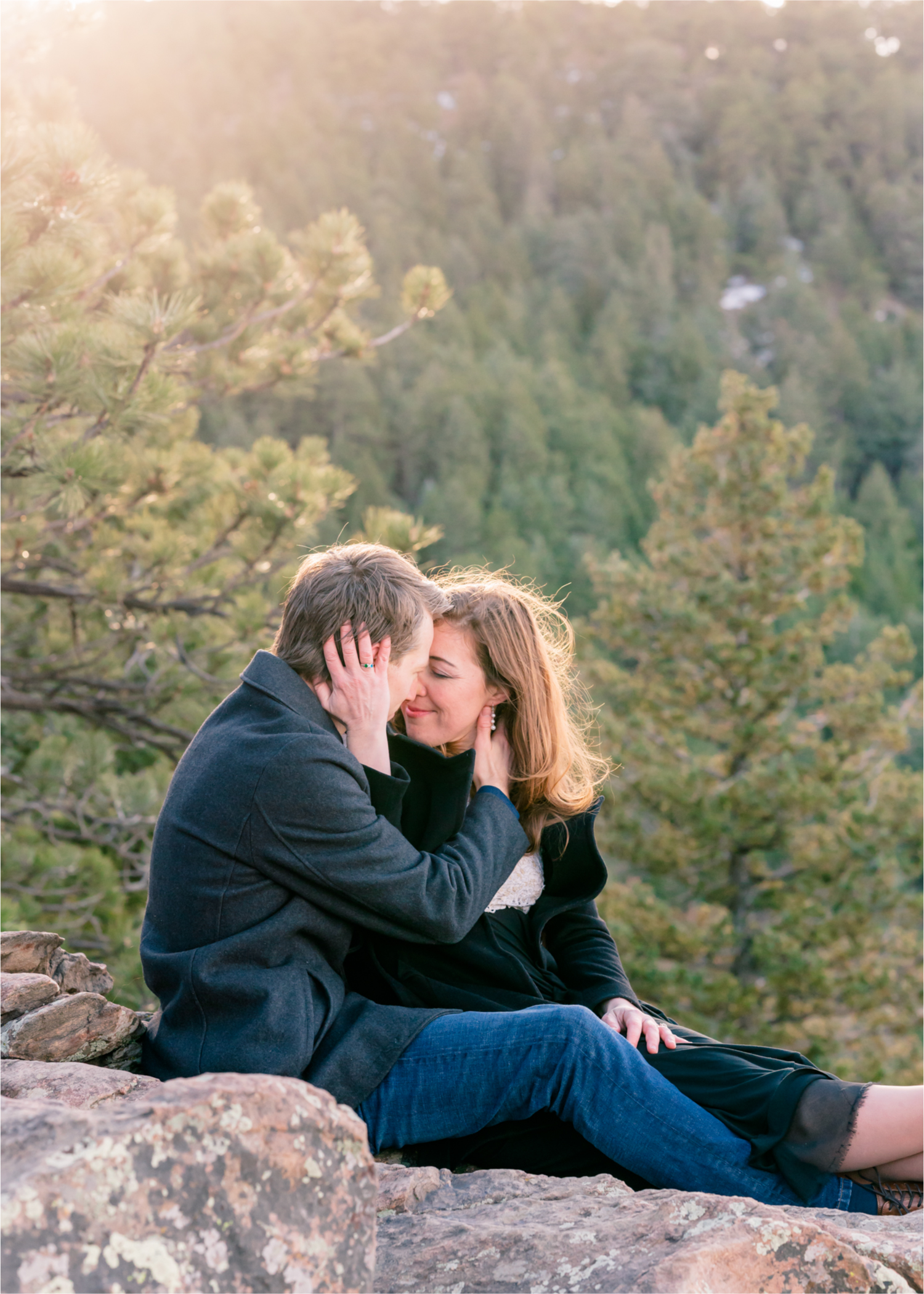 Winter Engagement on Lookout Mountain in Golden Colorado | Britni Girard Photography | Destination Photo and Video Team | Epic views of Golden, dreamy sunsets, dancing and snuggles.  A sweet couple shares time of prayer together during their romantic engagement session.