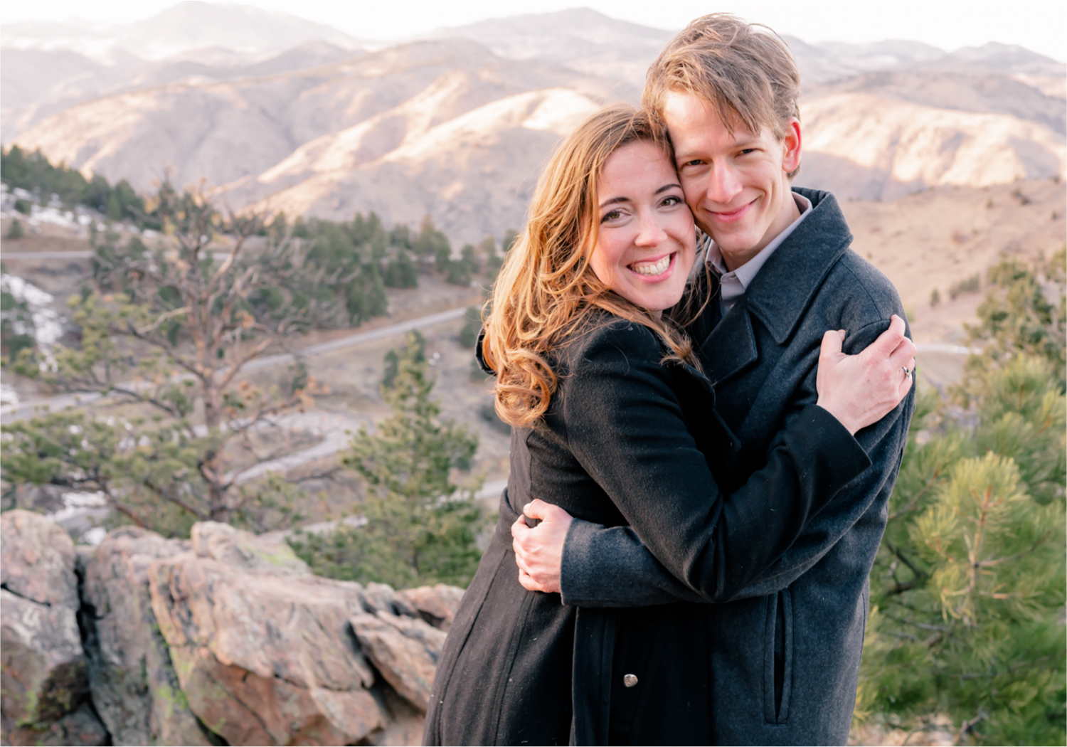 Winter Engagement on Lookout Mountain in Golden Colorado | Britni Girard Photography | Destination Photo and Video Team | Epic views of Golden, dreamy sunsets, dancing and snuggles.  A sweet couple shares time of prayer together during their romantic engagement session.