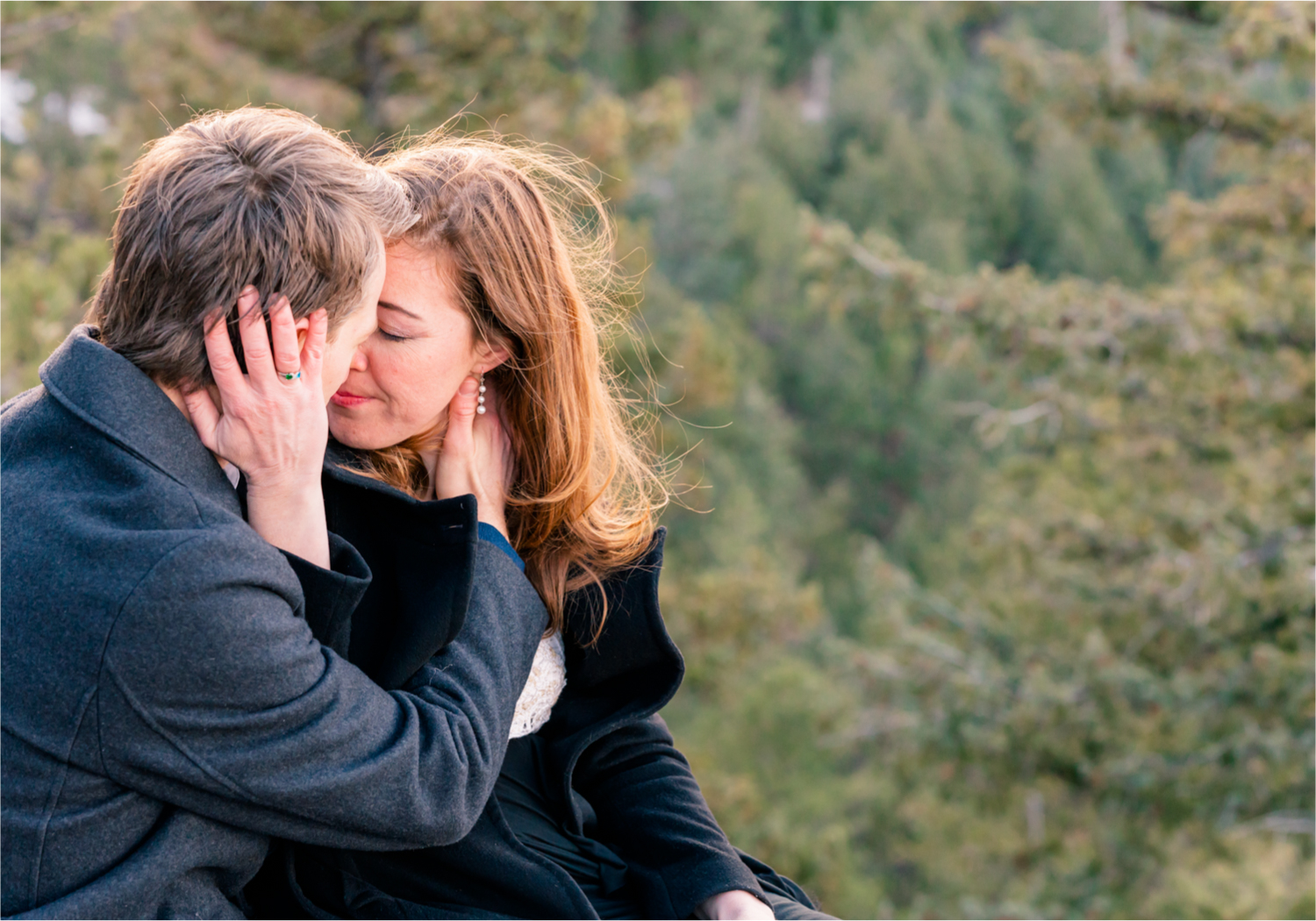 Winter Engagement on Lookout Mountain in Golden Colorado | Britni Girard Photography | Destination Photo and Video Team | Epic views of Golden, dreamy sunsets, dancing and snuggles.  A sweet couple shares time of prayer together during their romantic engagement session.