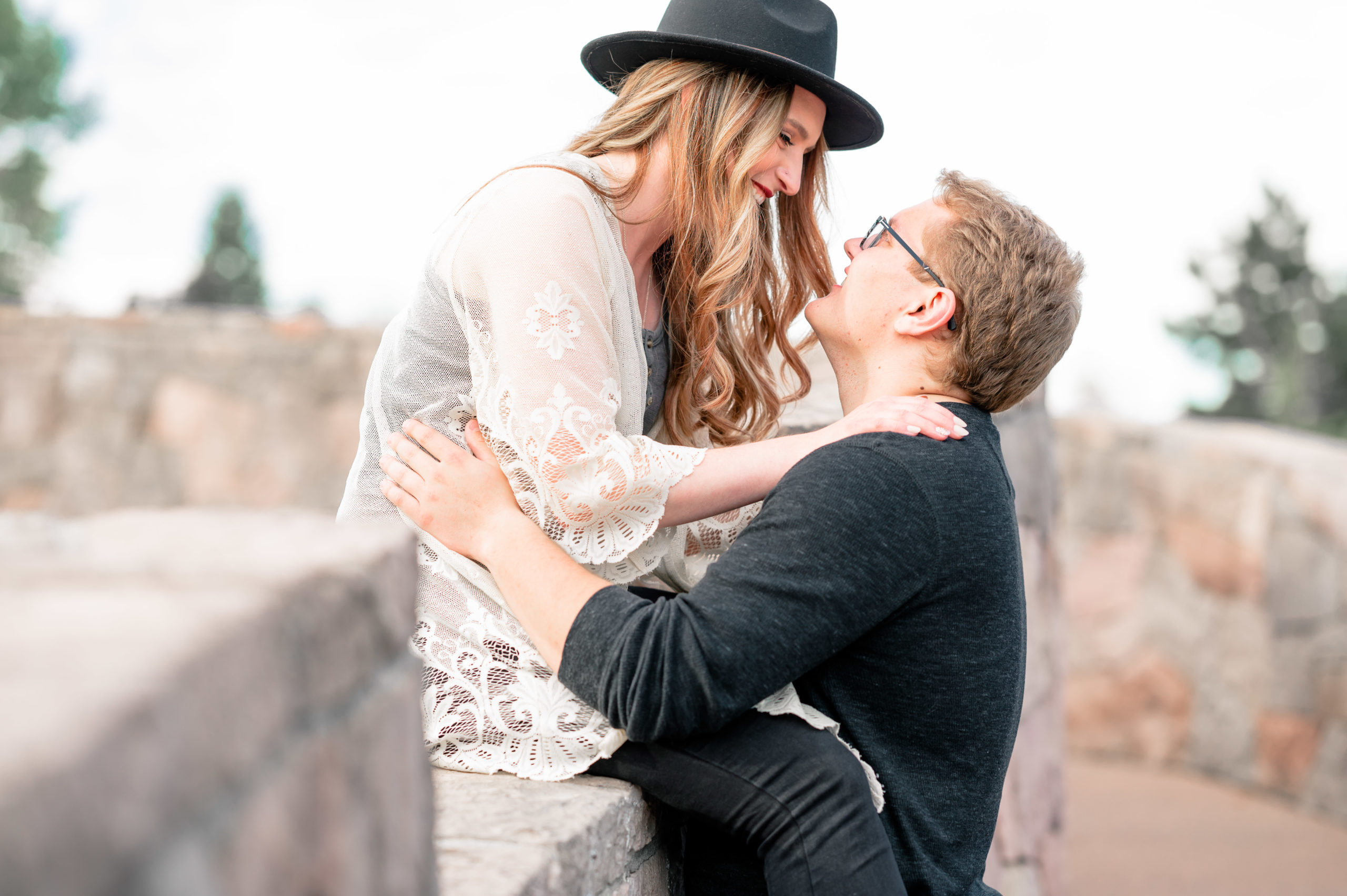 Downtown Denver Spring Engagement at Commons Park | Britni Girard Photography | Destination Wedding Photographer and Videographer | Colorado Engagement | Strolling down rows of trees