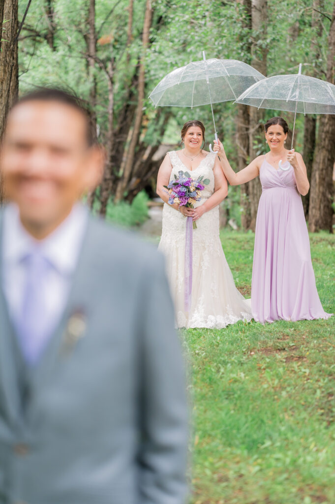Rain on Wedding Day at The Landing | Britni Girard Photography - Tips for Photographers for rain on a wedding day - Find tall tree's to stand under for portraits