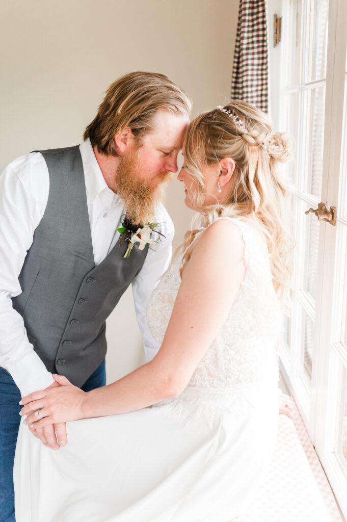 Rain on Wedding Day at Sylvan Dale Ranch in Loveland | Britni Girard Photography - Tips for Photographers for rain on a wedding day - Take advantage of the down time and shoot near a window