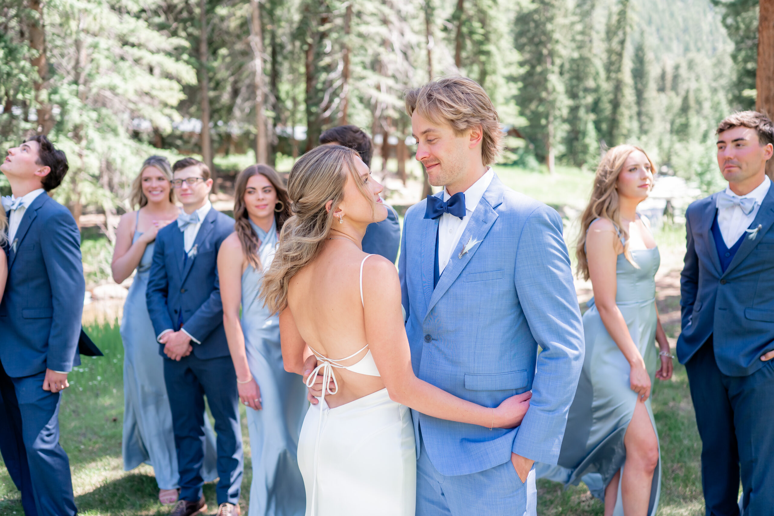 Haley and Noah celebrating their wedding at a private family ranch surrounded by the Colorado mountains in Evergreen.
